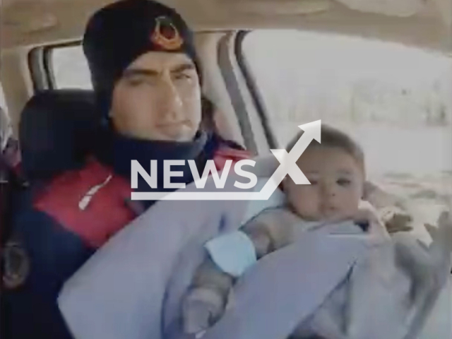 Photo shows a police holding a baby girl named Nergiz, undated. Nergiz was rescued in Adiyaman, Turkey, Thursday, Feb. 9, 2023. Note: Photo is from the Gendarmerie General Command of Turkey (@jandarma/Newsflash)