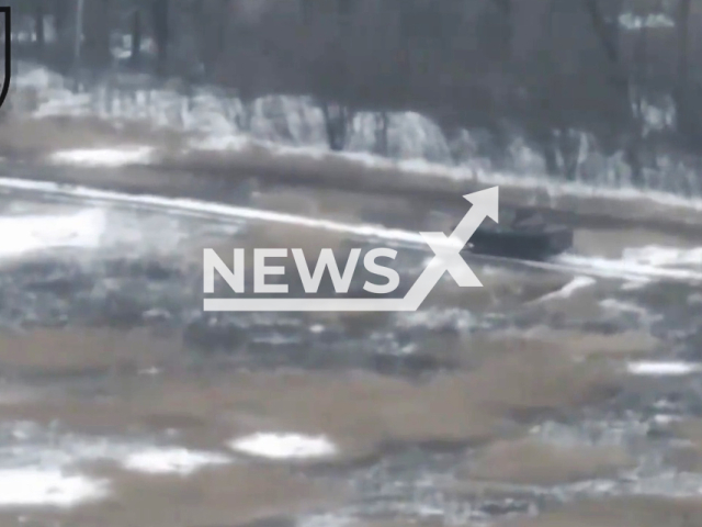 Russian tank moves down the snowy road in Donetsk region, Ukraine in undated footage. The footage was released by the 36th brigade of the Ukrainian Navy on Friday, Feb. 10, 2023. Note: Picture is a screenshot from a video (@36obmp/Newsflash)