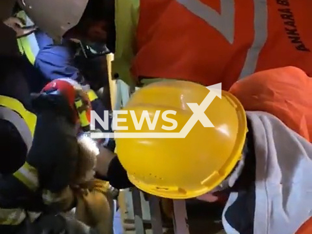 Rescuers pull out a three-year-old boy named Eymen under the rubble in Hatay, Turkey, Thursday, Feb. 9, 2023. Thousands of people died and were injured as a result of a massive earthquake in Turkey, Monday, Feb. 6, 2023. Note: Picture is a screenshot from a video (Ankara Metropolitan Municipality/Newsflash)