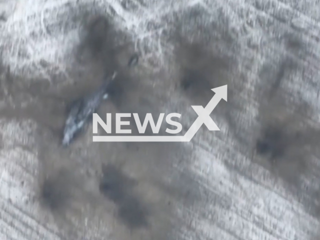 Picture shows destroyed Russian enemy Mi-24 helicopter in a snowy field in Ukraine in undated footage. The footage was released by the 14th brigade of the Ukrainian Ground Forces on Thursday, Feb. 9, 2023. Note: Picture is screenshot from a video. (@14ombr/Newsflash)