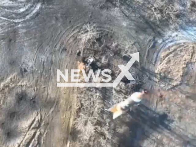 Bomb falls on Russian soldiers in trenches in Bakhmut, Donetsk region, Ukraine in undated footage. The footage was released by the 93rd brigade of the Ukrainian Ground Forces on Saturday, Feb. 11, 2022. Note: Picture is a screenshot from a video (@93OMBr/Newsflash)