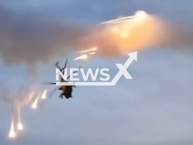 Ukrainian helicopter fire missiles at Russian military positions in Ukraine in undated footage. The footage was released by the 12th separate brigade of army aviation on Monday, Feb. 13, 2023. Note: Picture is a screenshot from a video (@12o.br.AA/Newsflash)