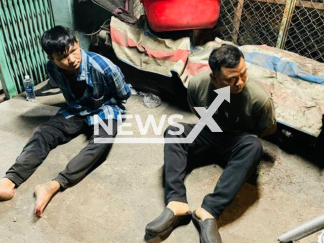 Nguyen Hoang Trieu, 43,   and Nguyen Duy Khanh, 43, pose in undated photo. Police arrested them after they found dozens of bodies of stolen dogs and many tools for slaughter in their possession in Binh Chanh, Vietnam. Note: Private photo. (Newsflash)