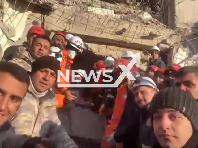 Two brothers wave at a camera before being pulled under rubble in Kahramanmaras, Turkey, Tuesday, Feb. 14, 2023. Two brothers, Muhammed Enes Yeninar, 17, and Baki Yeninar, 21, were rescued in Kahramanmaras, 198 hours after the deadly earthquakes. Note: Picture is a screenshot from a video (@jandarma/Newsflash)