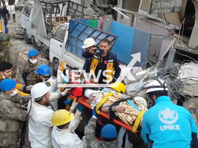 Fourth Commando Brigade rescues a 17-year-old girl, Asya, alive from the rubble of a collapsed building in Hatay, Turkey, in undated footage. Thousands of people have been left injured as a result of the earthquake. Note: Picture is screenshot from a video. (@TCMilliSavunmaBakanligi/Newsflash)