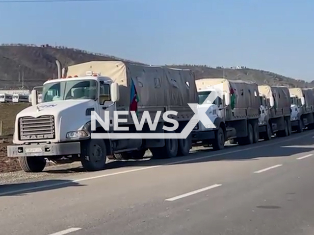 Humanitarian aid convoy of the Ministry of Emergency Situations of Azerbaijan arrives in Turkey in undated footage. Thousands of people have been left injured as a result of the earthquake. Note: Picture is screenshot from a video. (@azerbaycanfhn/Newsflash)