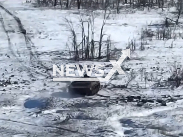 Picture shows Russian armored vehicle on a snowy field in Ukraine in undated footage. The footage was released by the 8th battalion of the Ukrainian Ground Forces on Tuesday, Feb. 14, 2022. Note: Picture is a screenshot from a video (@8OGSHB/Newsflash)