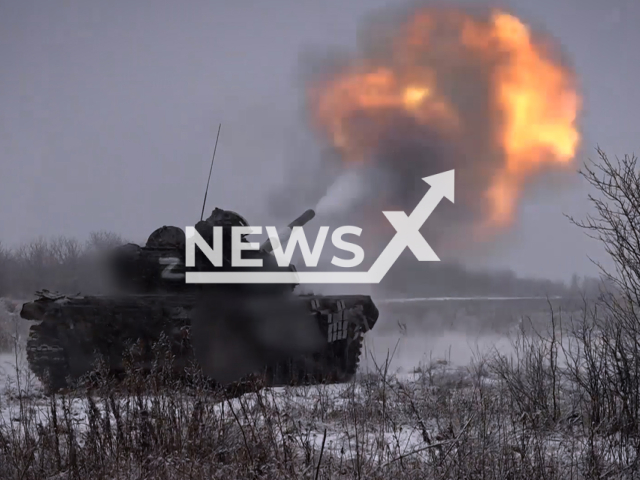 Russian T-72B3 tanks fire at Ukrainian fortified positions in Ukraine in undated footage. The footage was released by the Russian MoD on Thursday, Feb. 16, 2023.
Note: Picture is a screenshot from a video (Ministry of Defense of Russia/Newsflash)