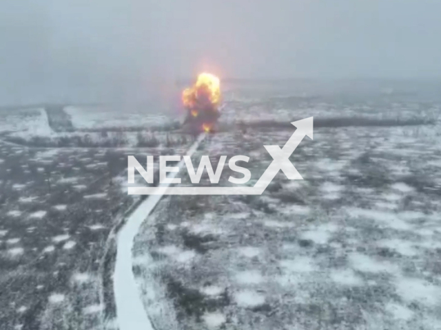 Picture shows an explosion on a snowy field in Ukraine in undated footage. The footage was released by the 81st brigade of the Ukrainian Air Assault Forces on Monday, Feb. 13, 2022. Note: Picture is screenshot from a video. (@81oaembr/Newsflash)