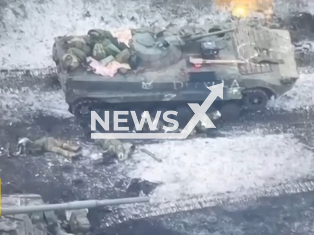 Picture shows wounded Russian soldiers and their tank near Vuhledar, Donetsk region, Ukraine in undated footage. The footage was released by the 68th brigade of the Ukrainian Ground Forces on Thursday, Feb. 16, 2022. Note: Picture is a screenshot from a video (@68brigade/Newsflash)