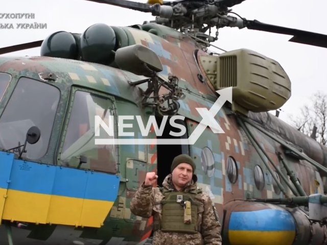 Picture shows Ukrainian military journalist in Ukraine in undated footage. The footage was released by the Ukrainian Ground Forces on Thursday, Feb. 16, 2022. Note: Picture is a screenshot from a video (@UkrainianLandForces/Newsflash)