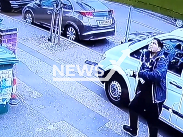 This image shows the suspect throwing a package of cocaine before police officers arrest him in Peterborough, England on Sept.2, 2023. The suspect is jailed with 3 and a half years imprisonment. Note: This picture is a screenshot from the video. ( CambridgeshirePolice/Newsflash)