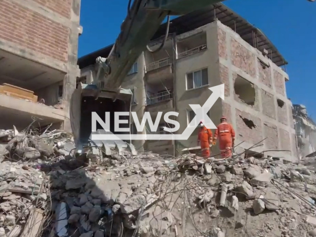 This picture shows emergency workers continuing their search and rescue efforts as they fight time to locate any survivors of the earthquake in Turkey, undated. Note: Picture is screenshot from a video. (TR Ministry of National Defense/Newsflash)