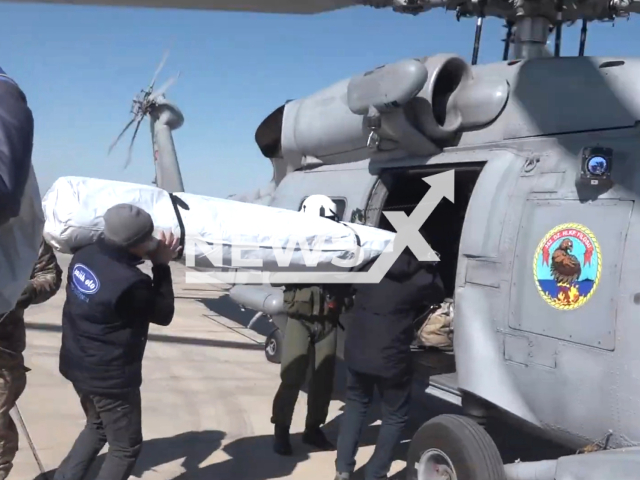 Turkish naval forces carry aid materials for the earthquake victims in Turkey, in undated footage. Thousands of people have been left injured as a result of the earthquake. Note: Picture is a screenshot from a video (@TCMilliSavunmaBakanligi/Newsflash)