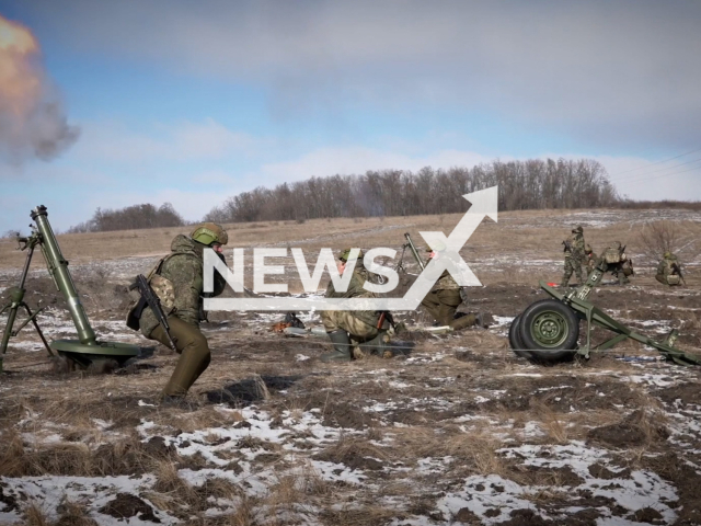 Russian 120-mm mortars fire at Ukrainian military positions in Ukraine in undated footage. The footage was released by the Russian MoD on Friday, Feb. 17, 2023.
Note: Picture is a screenshot from a video (Ministry of Defense of Russia/Newsflash)