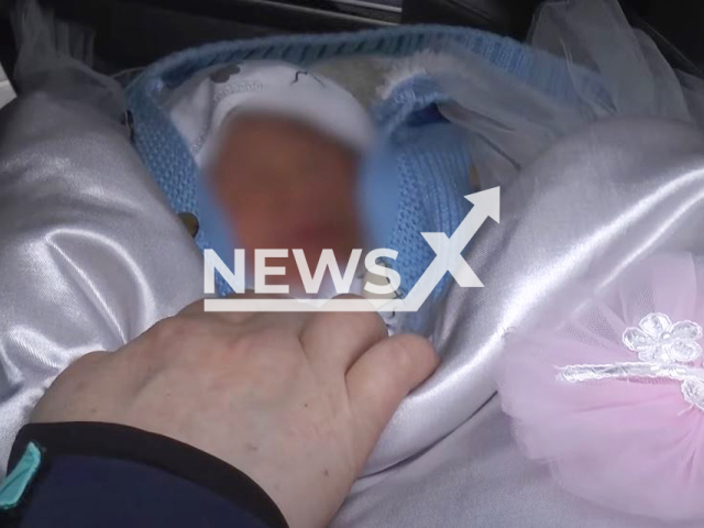 Picture shows the baby, undated. Police arrested parents trying to sell newborn for 2 million tenge (GBP 3720) in Almaty, Kazakhstan. Note: Picture is a screenshot from a video (Almaty Polisiasy/Newsflash)