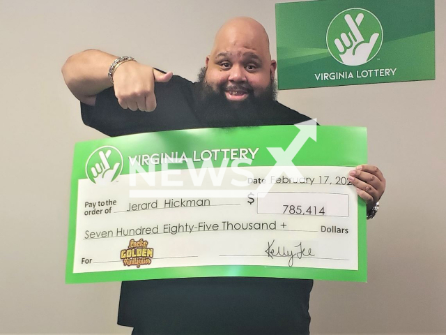 Jerard Hickman poses with his wining lottery  check, undated. When he get   bored  he went to the Virginia Lottery’s website to play some online games and won the 785,414 dollars jackpot.
 
Note: Licensed photo.  (Virginia Lottery/Newsflash)