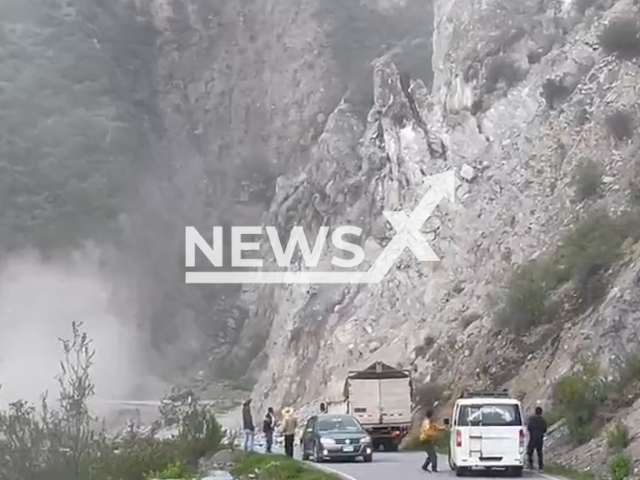 Several huge stones collapse  on the highway, in Pausa, Peru, on Wednesday, Feb. 22, 2023. There were no injuries, the cause was heavy rains, it left the road blocked and people isolated.  Note: Picture is screenshot from a video. (@COENPeru/Newsflash)