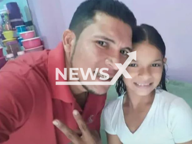 Getulio Rodrigues Frazao Junior, 36, and daughter Larissa Frazao de Almeida, 12, pose in undated photo. Edgar Ricardo de Oliveira, 30, and Ezequias Souza Ribeiro, 27, shoot  people in a bar, in Sinop, Brazil, on Tuesday, Feb, 21, 2023, and the father and daughter were among the victims. 
Note: Private photo. (Newsflash)