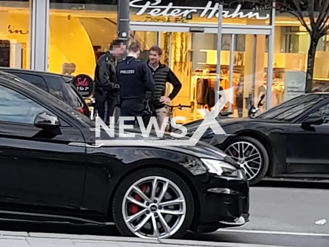 Image shows Jens Lehmann, 53, talking to a police officer and another driver, undated photo. He reportedly had an incent with this Porsche in the city of Munich, in Bavaria, Germany, on Wednesday, Feb. 22, 2023. Note: Private photo. (Newsflash)