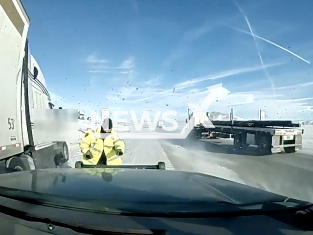 Semi-truck almost hits a Wyoming Highway Patrol officer on Interstate 80, near Rawlins, Wyoming, in undated footage. Fortunately, no one sustained any serious injures. Note: Picture is screenshot from a video. (Wyoming Highway Patrol/Newsflash)