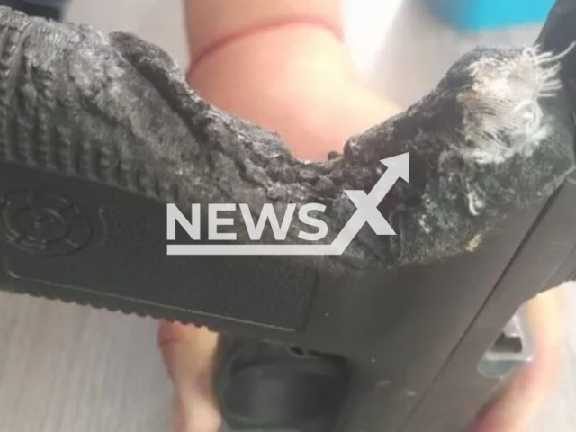 Picture shows the burnt gun, undated.  The officer hid his service weapon in the oven, then went out  and when he and his wife returned, they began to prepare lunch and noticed a  burning smell, in Mendoza, Argentina. Note: Private photo.  (Newsflash)