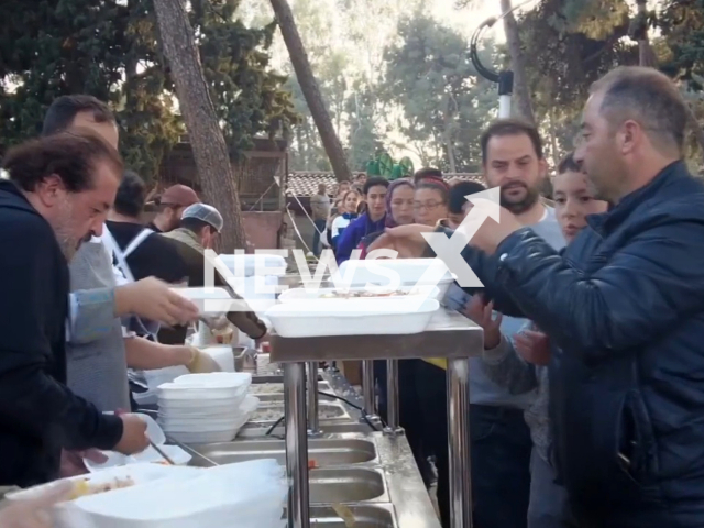 Earthquake victims take delicious meals in Hatay, Turkey, in undated footage. The meals were cooked by the famous chef Mehmet Yalcinkaya and some soldiers. Note: Picture is a screenshot from a video (@TCMilliSavunmaBakanligi/Newsflash)