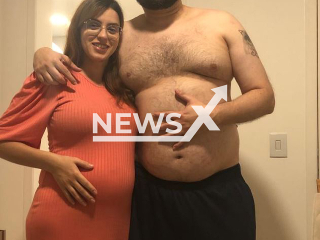 Letycia Peixoto Fonseca, 31, poses with an unidentified man in an undated photo. She was eight months pregnant,   when she was shot during a robbery in Campos dos Goytacazes, Brazil, on Thursday, March, 2, 2023, and died along with her son Hugo.
Note: Private photo.  (Newsflash)