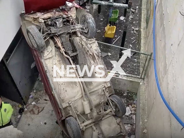 Photo shows a vehicle after it fell down a shaft near an apartment building in Sinop, Turkey, undated. The driver of the vehicle reportedly lost control of it. Note: Picture is a screenshot from a video (Newsflash)