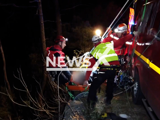 Firemen rescue a 72-year-old man, in Portes, Gard, France, on Thursday, March 2, 2023. The man was transported by ambulance to the ALES hospital center for checks. Note: Picture is screenshot from a video. (@pompiersdugard-sdis3079/Newsflash)