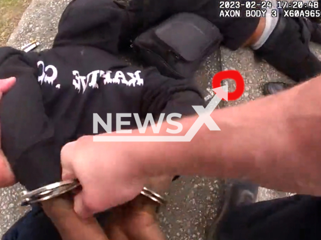 Officers from the Zone 5 Field Investigations Team arrest a homicide suspect during a drug bust, in Atlanta, Georgia, on Friday, Feb. 24, 2023. Two suspects were arrested, identified as Jamiequev Andrews and Kenneth Rashad Hil. Note: Picture is screenshot from a video. (@Atlanta_Police/Newsflash)