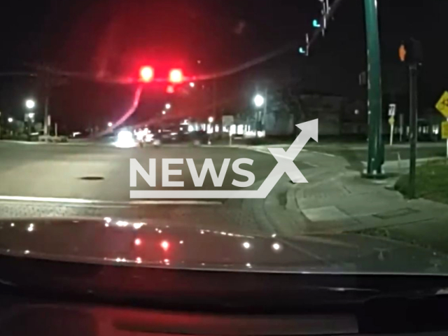 Fleeing motorcyclist gets hit by a truck, in Volusia County, Florida, on Saturday, Mar. 4, 2023. The motorcyclist flipped off a police officer moments before the crash.  Note: Picture is screenshot from a video. (@VolusiaSheriff/Newsflash)