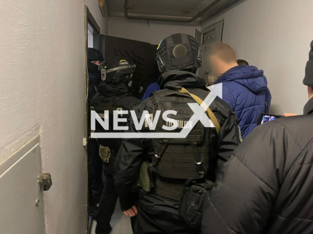 Image shows the Ukrainian police searching a possible suspect on the suspicion of cybercrime, undated photo. He was believed to be a member of the core DoppelPaymer group. Note: Licensed content. (LKA NRW/Newsflash)