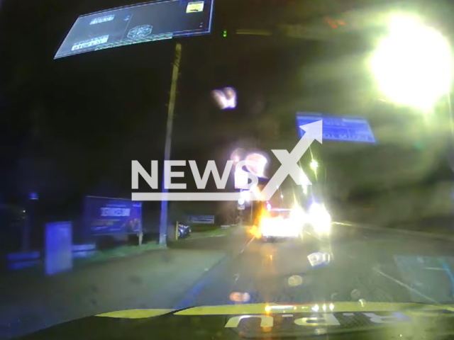 Picture shows an officer's point of view during the hot pursuit involving a runaway driver, Orges Hoxha, 24, in Mansfield Woodhouse, England, on Monday, Feb. 27, 2023. Hoxha was ultimately found hiding in a pond, using the pond reeds for cover. Note: Picture is a screenshot from a video. (@nottinghampolice/Newsflash)