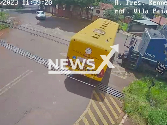 Picture shows the moment before a  school bus is hit by a train in Jandaia do Sul, Brazil, on Thursday, March, 9, 2023. Two girls died at the scene, out of 29 people on board,  three monitors, the driver and 25, six people were taken to the hospital. children Note: Picture is a screenshot from a video (Newsflash)