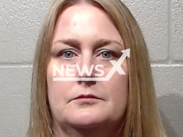 Jennifer Jean Hawkins, 45, poses in undated photo. The cheerleading coach was arrested for allegedly having a sexual relationship with a then-16-year-old student who had previously dated her own daughter, rapping him over 300 times, in Oklahoma City, Oklahoma, USA, in March, 2023.
Note: Police photo. (Cleveland County Detention Center/Newsflash)