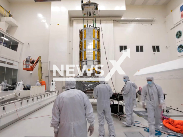 Video shows a timelapse of NASA and ISRO employees packing and moving the spacecraft known as NISAR. Note: Picture is screenshot from a video. (@NASAJPL/Newsflash)