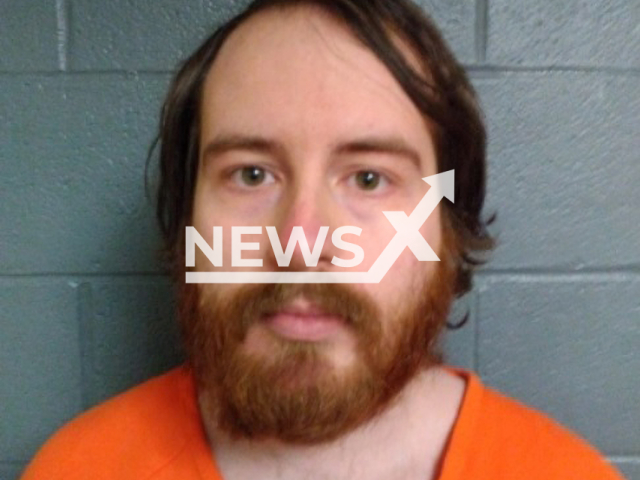 Ethan Colpetzer, 30, poses in undated photo. The custodian at Claysburg-Kimmel Elementary School in the community of Claysburg, Pennsylvania State, USA, was arrested and faces 75 counts of possession of child porn. Note: Licensed content. (Blair County Prison/Newsflash)