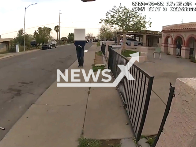 Picture shows an officer's point of views of the officer-involved shooting that occurred at 29th Ave & Madison Street, in Phoenix, Arizona, on Wednesday, Feb. 22, 2023. The Officer involved in this incident is assigned to the South Mountain Precinct and has more than 4 years of service with the department. Note: Picture is a screenshot from the video. (@phxpd/Newsflash)