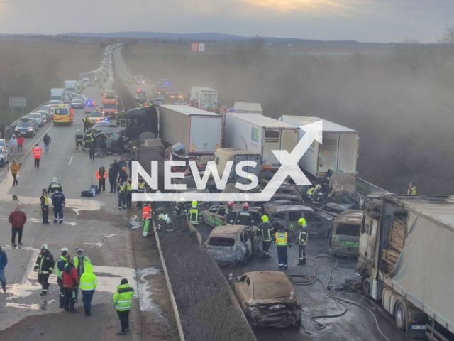 Photo shows the scene after dozens of vehicles collided in a pileup in M1 motorway near Budapest in Hungary, Saturday, March 11, 2023. The pileup caused 19 vehicles to catch fire and resulted in 39 injuries. Note: Photo is from the Hungarian police (@PoliceHungaryOfficial/Newsflash)