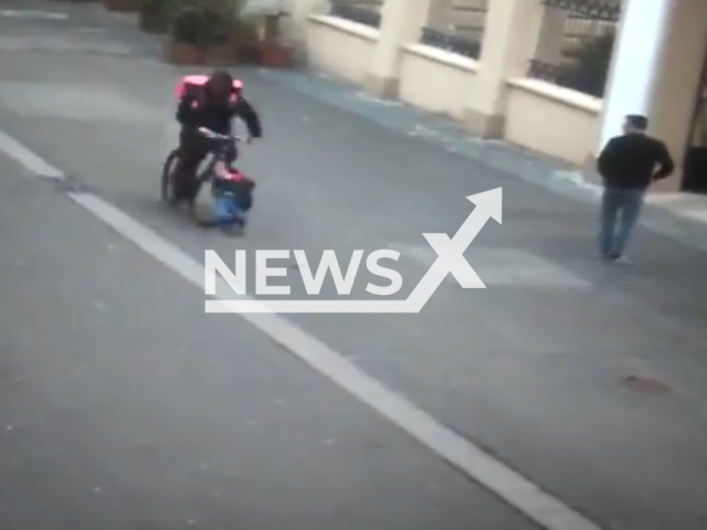 A bicycle delivery man hits a 2-year-old girl on a pedestrian street in Timisoara, Romania, on Friday, March, 10, 2023. The girl   was taken to hospital as she suffered a blow to the head, and the cyclist was taken away by ambulance, he will be investigated for culpable bodily harm and leaving the scene of the accident without the consent of the police. Note: Picture is screenshot from a video. (Newsflash)