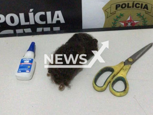 Picture shows th glue, hair that was cut from the victim, and scisors, undated.  A 26-year-old man was arrested for assaulting with kicks and punches, cutting the hair and using  adhesive glue on intimate parts his 18-year-old partner in Tres Pontas, Brazil, on Thursday, March, 9, 2023. Note: Police photo. (PCMG/Newsflash)