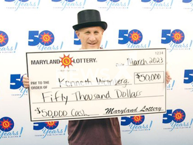 Kenneth Weinberg poses with his prie check, undated. He won USD 50,000 on a Cash scratch-off. Note: Licensed photo.  (Maryland Lottery/Newsflash)