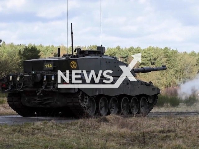 British Challenger 2 tank shoots at targets on the training ground in UK in undated footage. The UK will send a squadron of Challenger 2 tanks to Ukraine.Note: Picture is screenshot from a video. (@theministryofdefence/Newsflash)