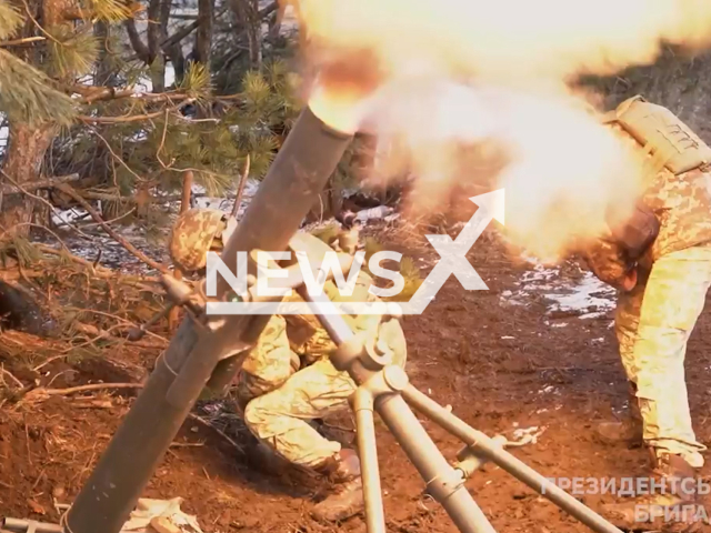 Ukrainian mortars shoots at Russian targets on the front line of Ukraine in undated footage. The footage was released by the Presidential Brigade of the Ukrainian Ground Forces on Monday, Mar. 13, 2023.Note: Picture is screenshot from a video. (@Prezydentska.Bryhada/Newsflash)