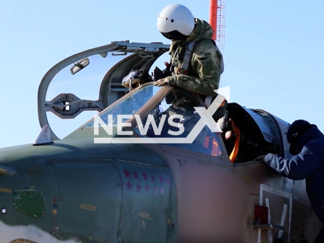 Russian pilot takes a sit into Su-25 attack aircraft in Ukraine in undated footage. The footage was released by the Russian Ministry of Defense on Wednesday, Mar. 15, 2023.Note: Picture is screenshot from a video.(@function.mil.ru/Newsflash)