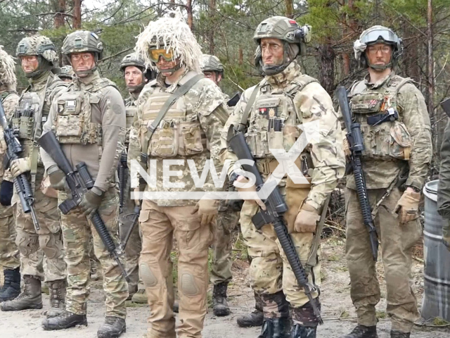 Picture shows Ukrainian soldiers with guns during combat training in the northern operational zone of Ukraine in undated footage. The footage was released by the 115th Zhytomyr brigade of the Ukrainian Territorial Defense Forces on Tuesday, Mar. 14, 2023. Note: Picture is a screenshot from a video (@brigadaA7043/Newsflash)