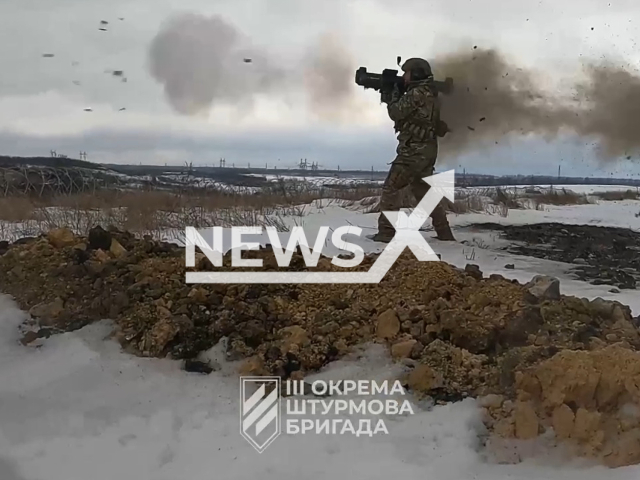 Ukrainian soldier shoots MANPADs in Bakhmut, Donetsk region, Ukraine in undated footage. The footage was released by the 3rd separate assault brigade of the Ukrainian Armed Forces on Wednesday, Mar. 15, 2023. Note: Picture is a screenshot from a video (@ab3.army/Newsflash)