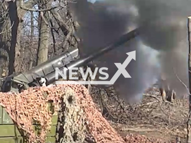 Ukrainian artillerymen shoot howitzer at two Wagner assault groups in Ukraine in undated footage. The footage was released by the K2 combat group of the Ukrainian Ground Forces on Wednesday, Mar. 15, 2023. Note: Picture is screenshot from a video. (@k_2_54/Newsflash)