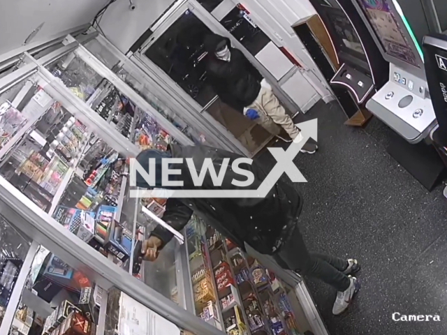 Two suspects attempt to rob a convenience store located at 7223 West Passyunk Avenue in Southwest Philadelphia, Pennsylvania State on March 10, 2023. One of them was armed with a gun and the other was carrying a wooden box containing an axe. (PhiladelphiaPolice/Newsflash)